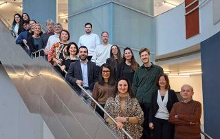 TENTACLE Consortium representatives posing on the stairs of the University of Würzburg.